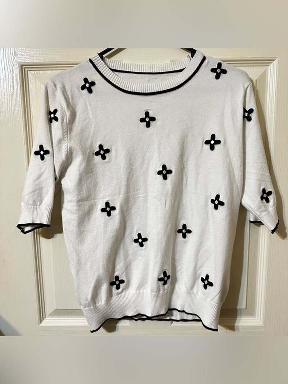 SHEIN White Crewneck Sweater with Black Floral Appliqué